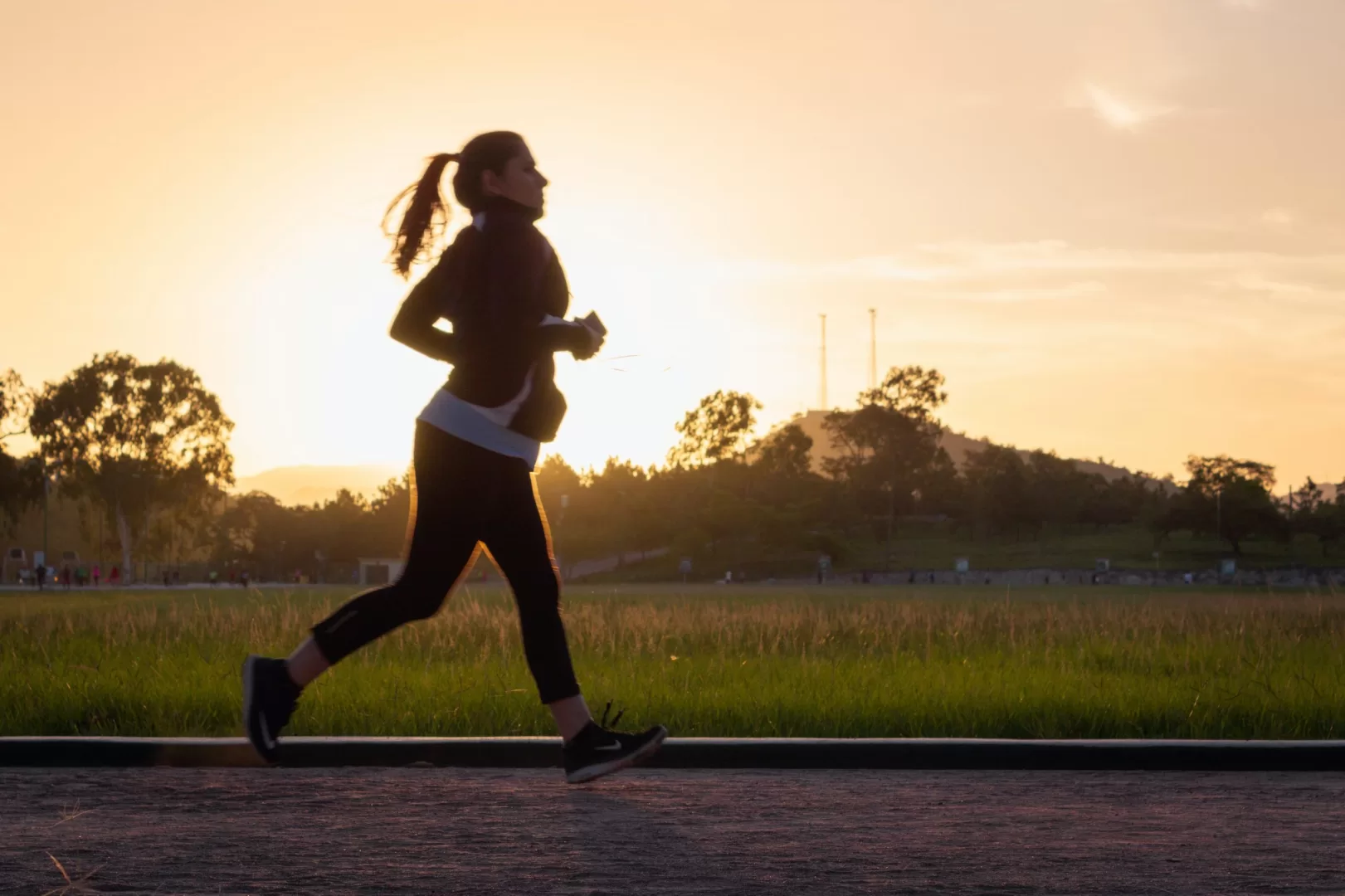 woman running at sunrise