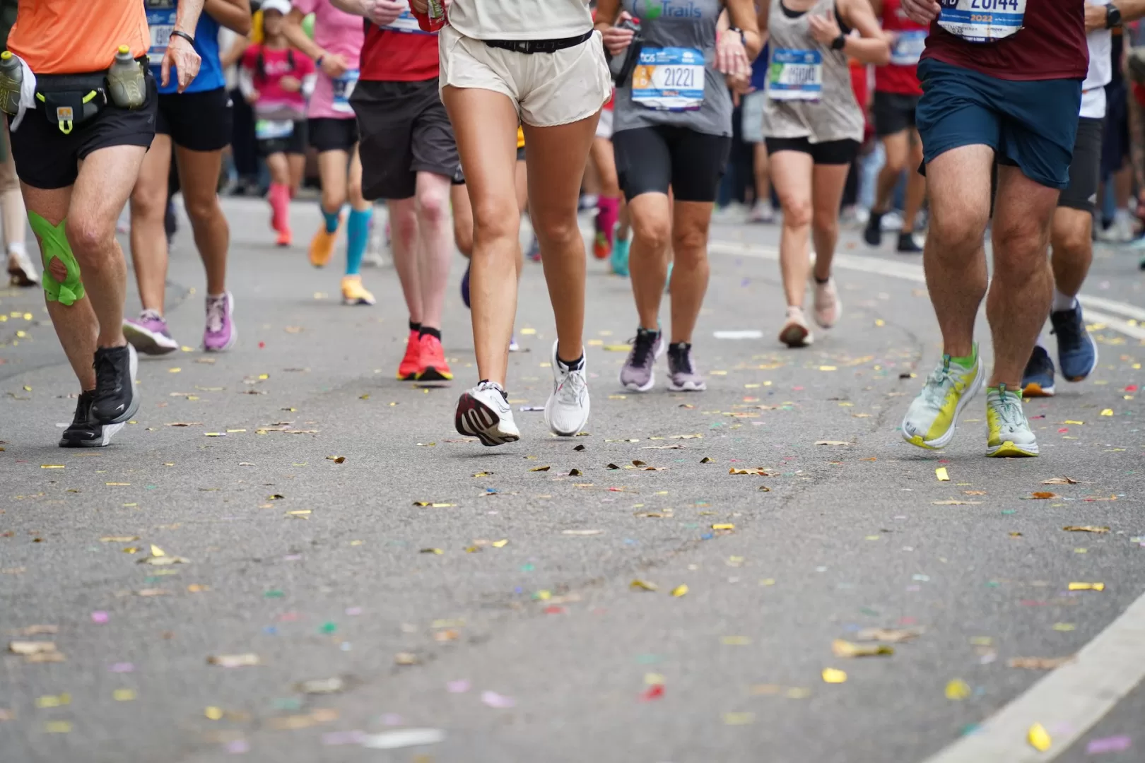 large group of running legs, perhaps running a marathon